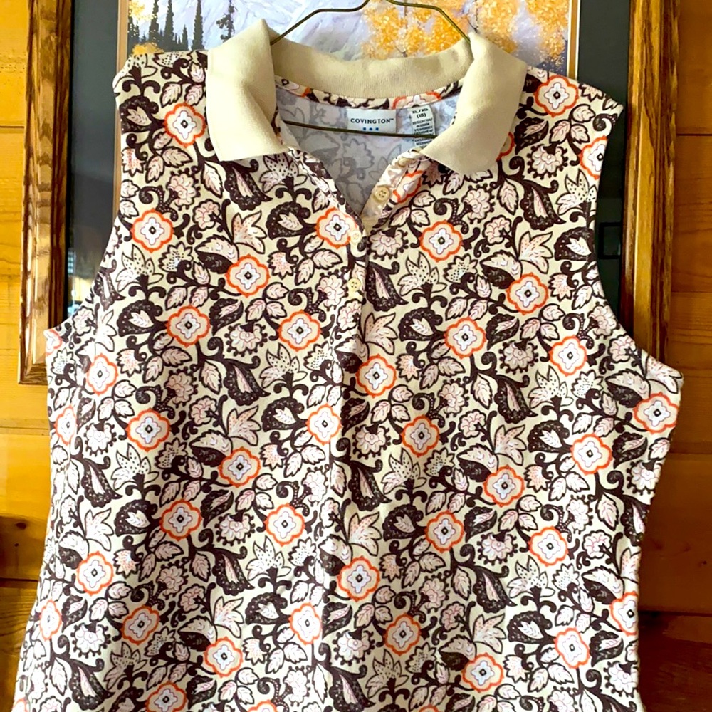 Very nice Covington, sleeveless shirt.